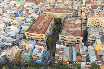 Ho Chi Minh city scape in Vo Van Kiet boulevard, canal, buildings and traffic around Cau Chu Y bridge, district 8