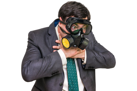 Businessman with gas mask can not breathe bad air