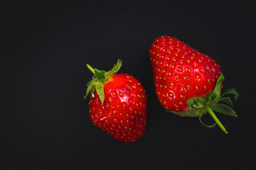 Close up organic Strawberry on black background