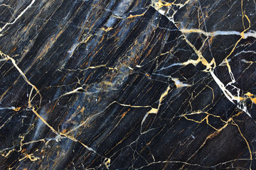 Gold yellow patterned natural of dark gray marble pattern for texture and design