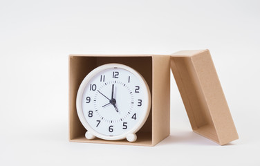 Circle clock in a box on white background