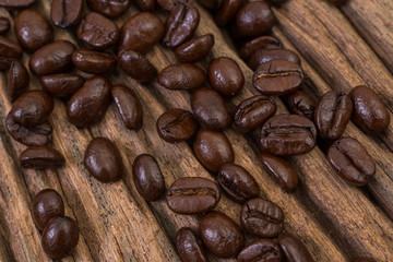 Roasted coffee bean on wood background