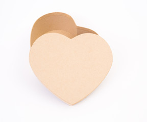 Brown heart shape papaer box on white background