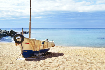 fishing boat beached in Lloret de Mar, Spain