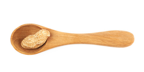 Single peanut in a spoon