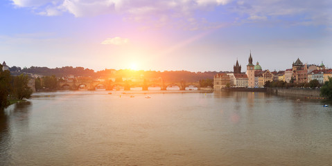 Prague - Vltava Embankment and Charles Bridge, the Czech Republic. Sunset