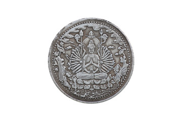 Old Chinese coin with guanyin isolated on white background