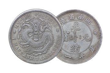 Vintage silver Chinese 7 mace and 2 Candereens coin from the Lung Kiang Province in China, circa 1889 isolated on white background