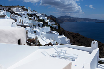 Landscape of famous greek village Oia at Santorin Island with view to the caldera 