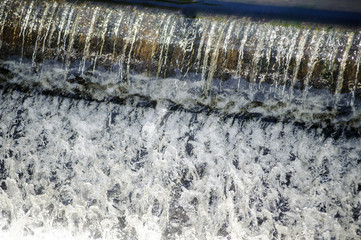Close up of water splashing from a waterfall