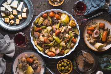 Ready-made kasul, cheese, bread, olives on the table