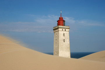 Lighthouse in the dunes after sand drift