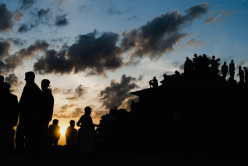 People silhouettes at sunrise in Brazil