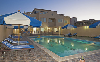 Swimming pool at at luxury tropical holiday villa