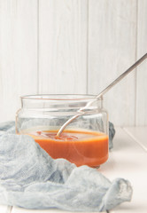 Salted caramel in a jar, dessert spoon, selective focus, vertical
