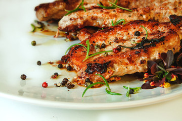 Grilled meat with pepper and rosemary
