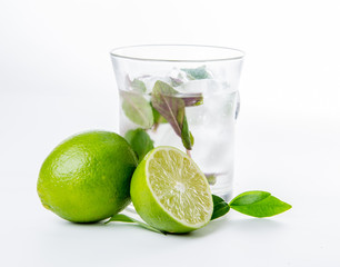 Fresh lemonade. Lime and green leaves