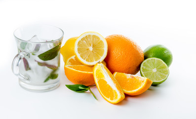 Fresh lemonade. Fruit. Orange lemon lime and green mint