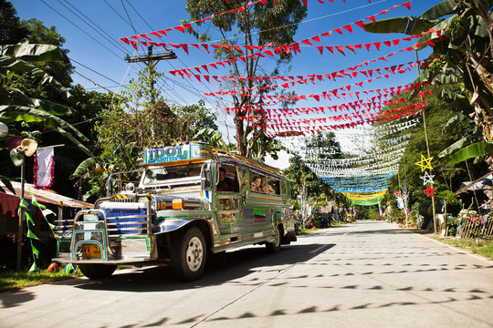 Colorful flags on tropical road