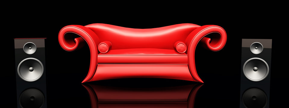 Rotes Sofa und Lautsprecherboxen vor schwarzem Hintergrund