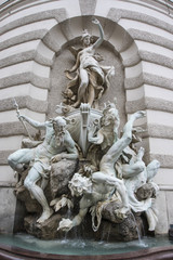 Naklejka premium Fountain the Power of the Sea near the Hofburg Palace in Vienna, Austria