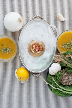 Pumpkin soup seeds onion and lemon