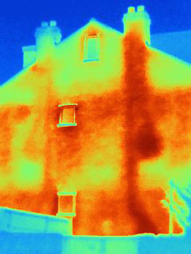 Thermal image of house and chimneys