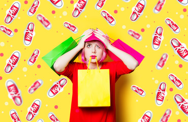 young woman with shopping bags