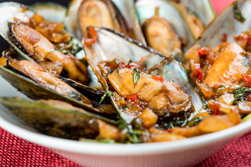 Mussel with white wine sauce on table