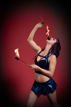 Fire eater performing
