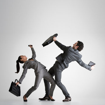 Business couple fighting