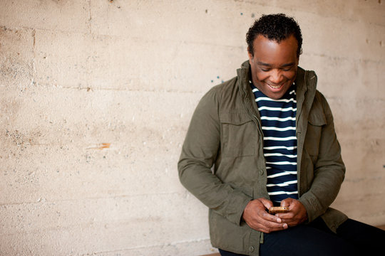 Man posing with charismatic smile and look of happiness
