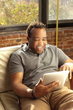 Man using digital tablet