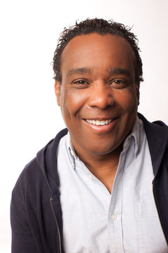 Man posing with charismatic smile and look of happiness