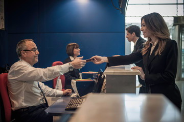 Businesswoman at airport check in area