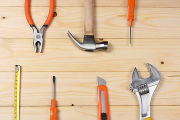industrial tools on light wooden background with copy space. top view. tools texture. tools background