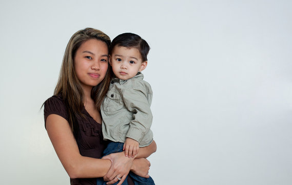 Portrait of mother and son, studio shot
