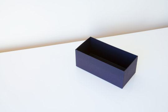 Empty box on white table