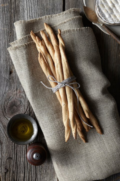 Breadsticks tied with string