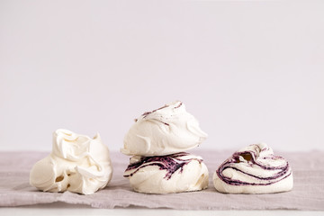 White and berry swirl meringue no white. Copy space for text. Food photography. 