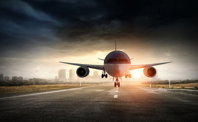 Fototapeta na wymiar Airplane over runway. Mixed media . Mixed media