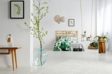 White bedroom with plants