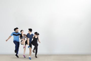 Group of young people doing workout