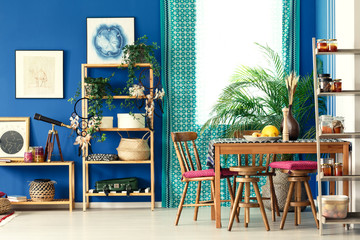 Postcolonial room with wooden bookcase