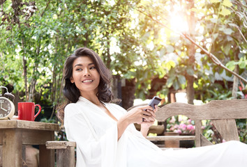 Relaxation woman reading laptop in the park
