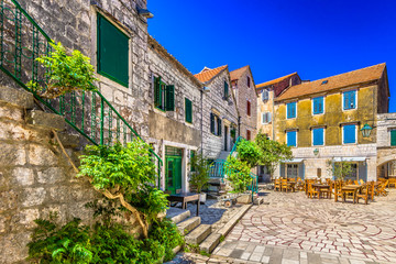 Mediterranean town Hvar island. / Colorful stone architecture at 2400 years old square in old town Stari Grad (Pharos) Island Hvar scenery, Croatia.