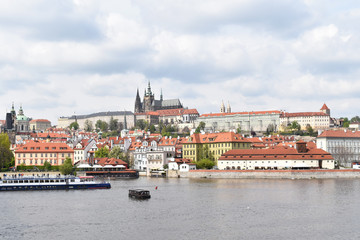 Fototapeta premium View of the city center of Prague in Czech Republic, seen by the bank of the river Vltava