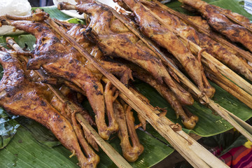 Thai-Style Grilled Chicken, or Gai Yang, on a Banana Lea