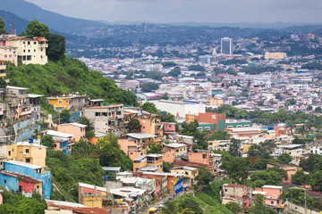 Fototapeta na wymiar Multicolored houses in the Las Penas district on the hill of St. Ana, Guayaquil, Ecuador