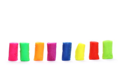 Set of colorful plasticine blocks isolated on white background